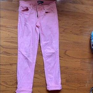 Pink ripped jeans